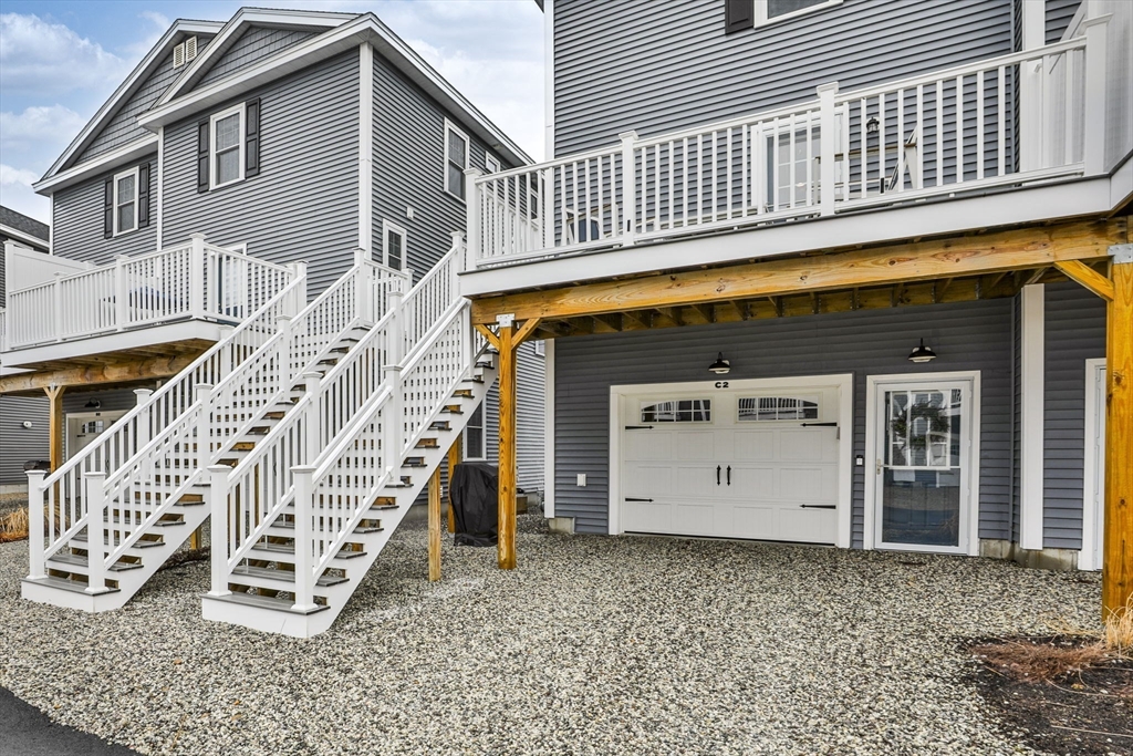207 Beach Road, Unit C2 Salisbury, MA 01952 - Photo 34 of 35 front view of a house with a stairs