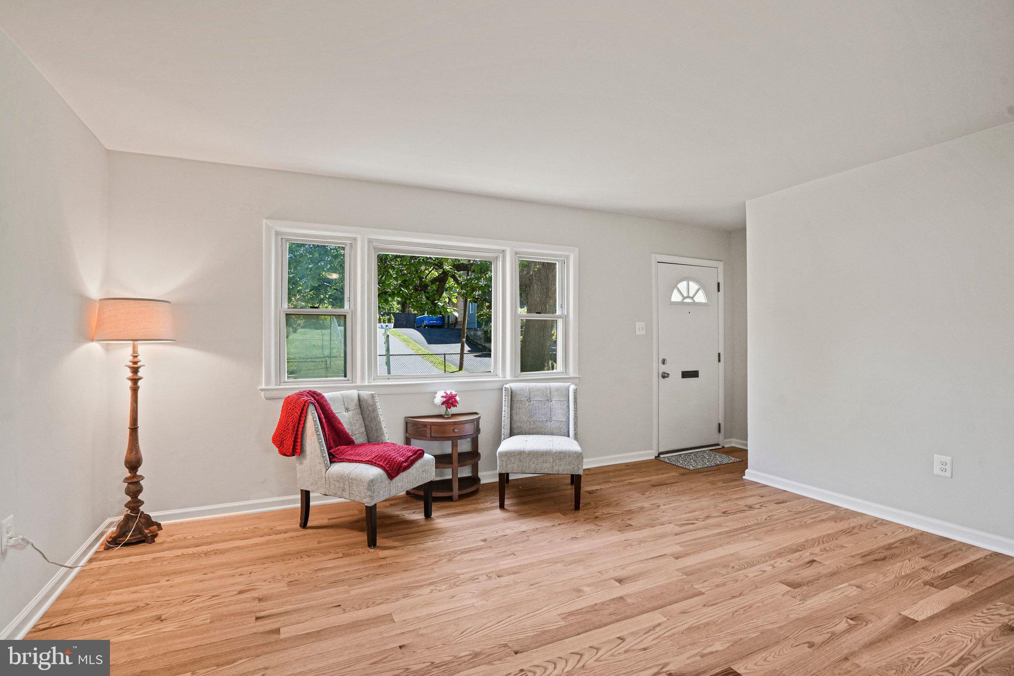 616 Ritchie Avenue Silver Spring, MD 20910 - Photo 2 of 37 a living room with furniture and a wooden floor