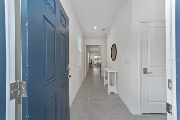 a view of a hallway with closet
