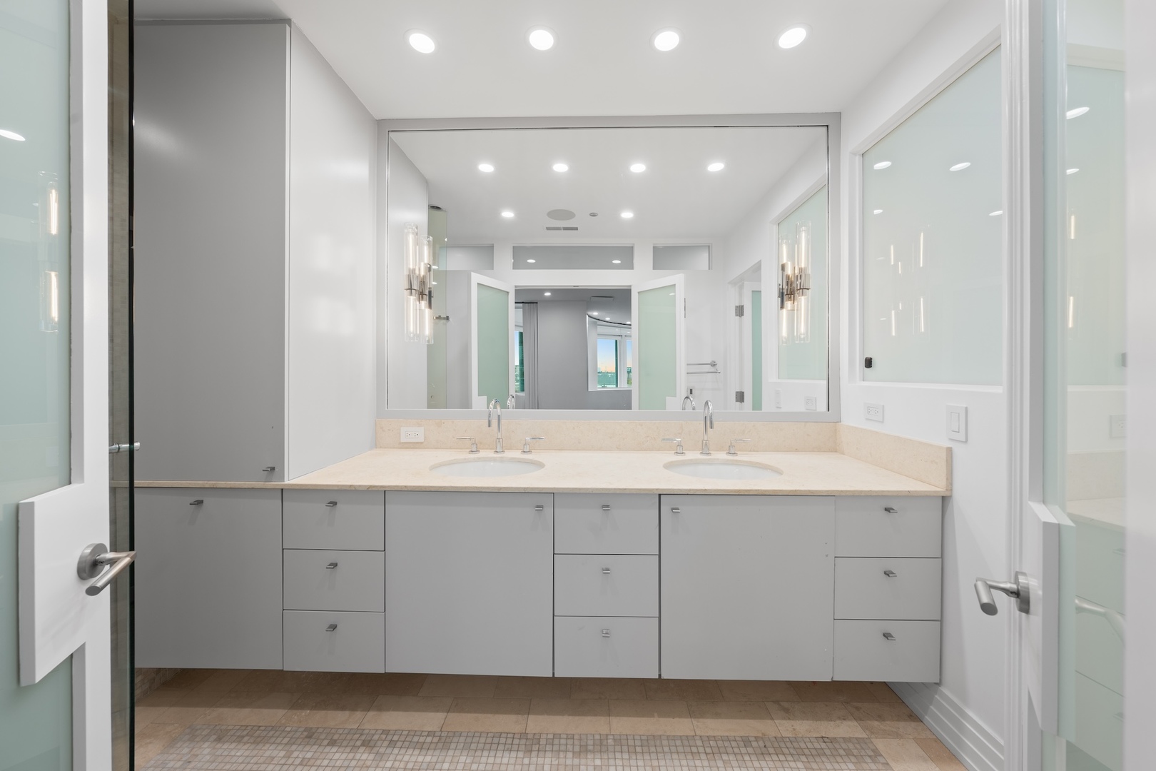 600 North Kingsbury Street, Unit 506 Chicago, IL 60654 - Photo 32 of 71 a bathroom with a double vanity sink and a mirror