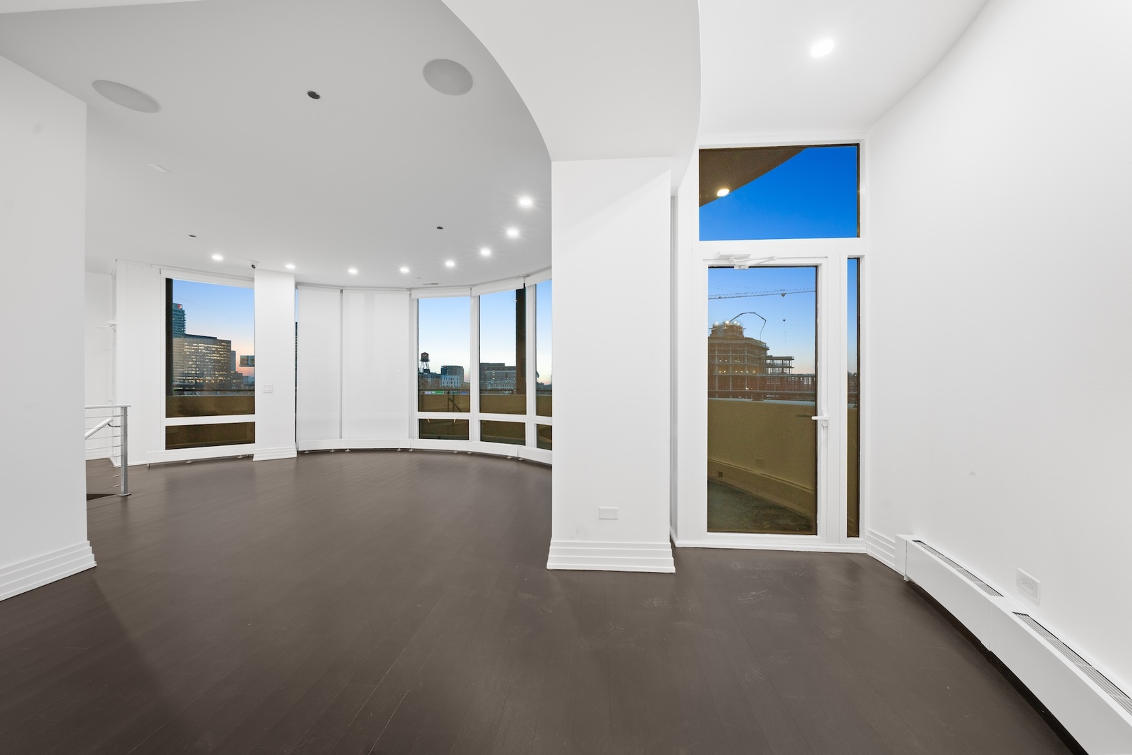600 North Kingsbury Street, Unit 506 Chicago, IL 60654 - Photo 62 of 71 a view of an empty room with a kitchen