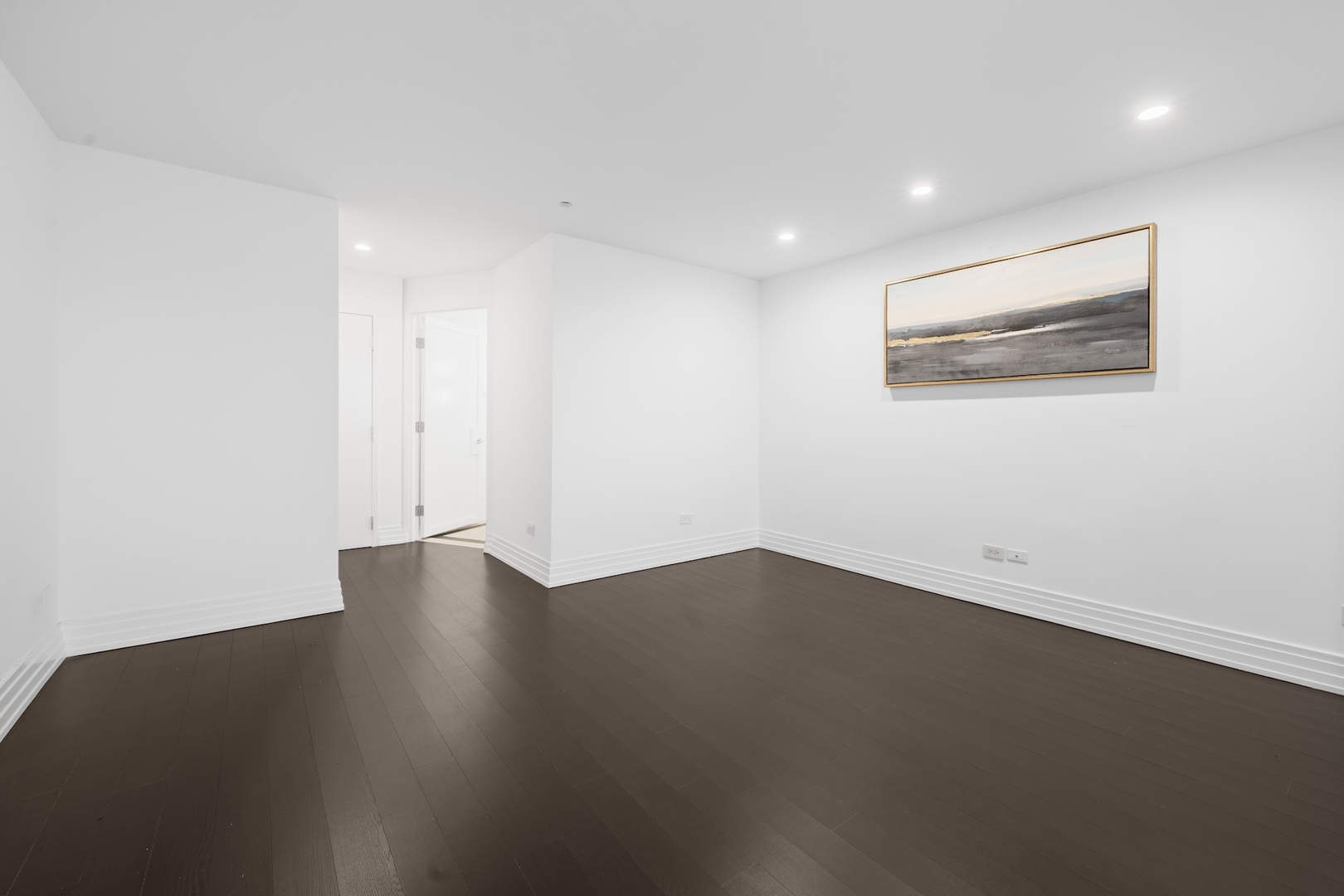 600 North Kingsbury Street, Unit 506 Chicago, IL 60654 - Photo 8 of 71 an empty room with wooden floor and windows