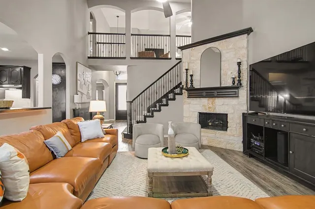 a room with furniture and a flat screen tv