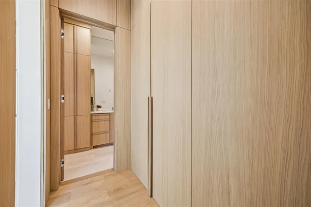 a view of a bathroom from the hallway