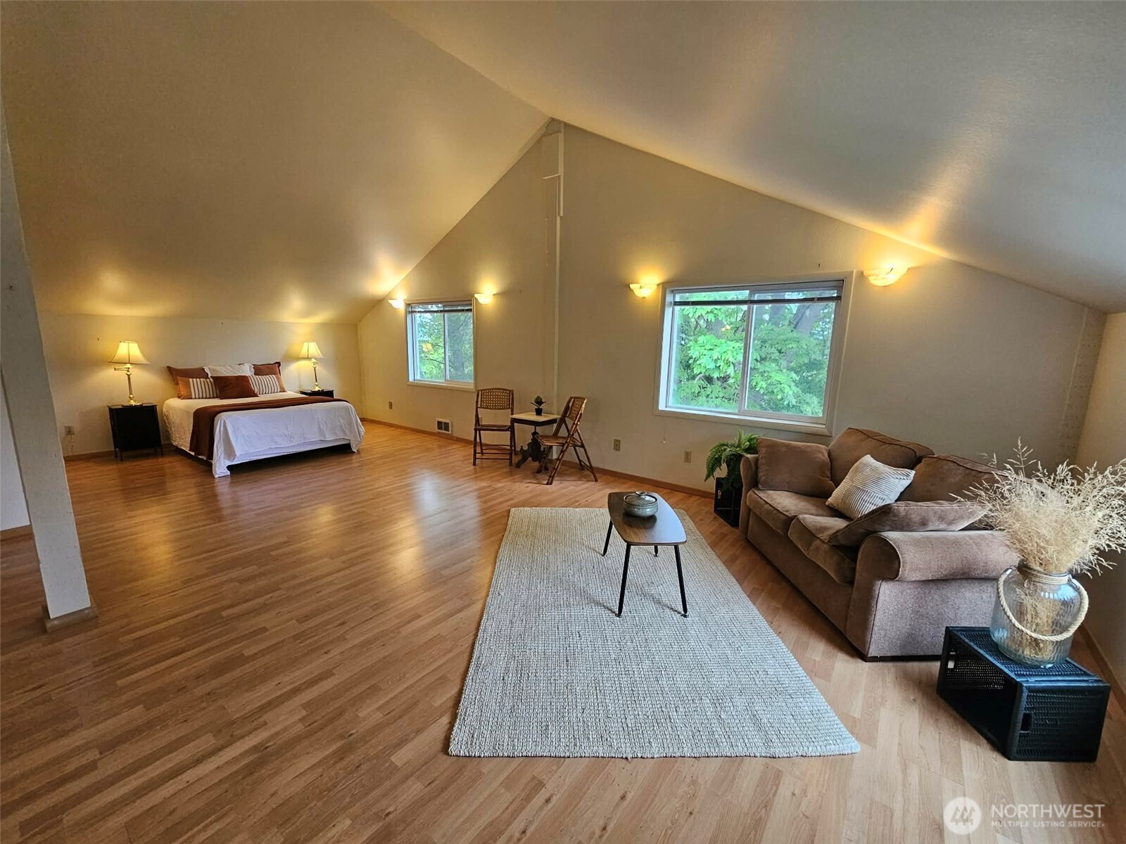 5477 Wilkinson Road Langley, WA 98260 - Photo 38 of 40 a living room with furniture and a wooden floor