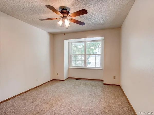 a view of an empty room with window