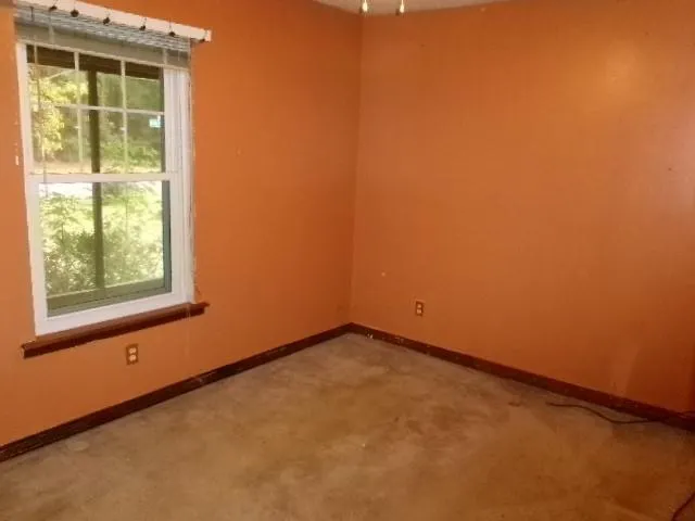 an empty room with a window