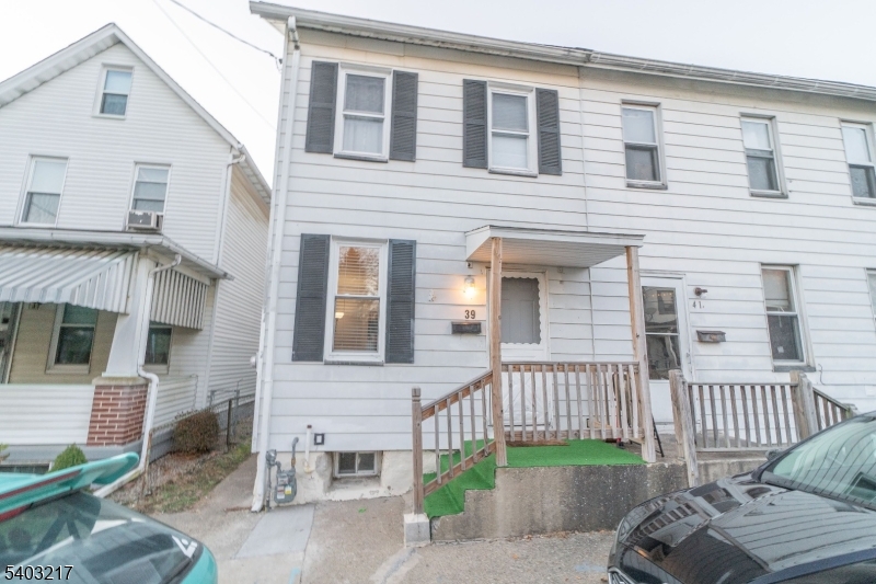 a view of a house with a roof deck