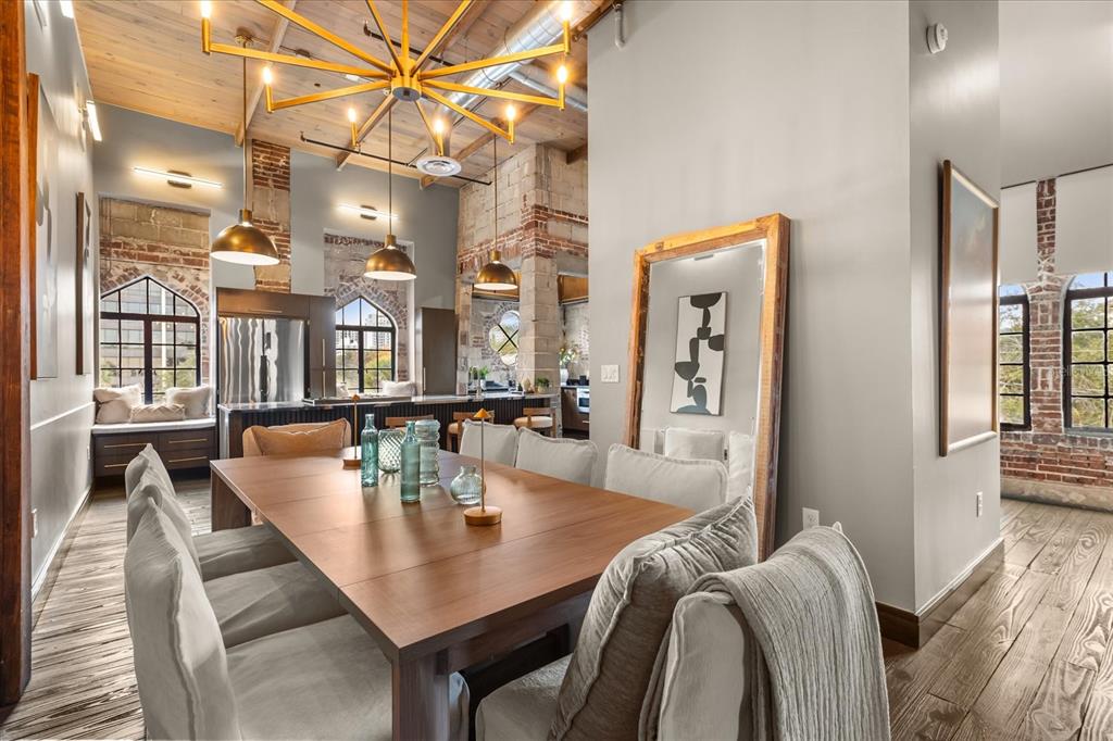 601 East Ridgewood Street Orlando, FL 32803 - Photo 16 of 86 a view of a dining room with furniture and wooden floor