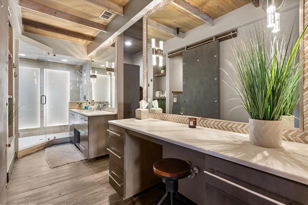 601 East Ridgewood Street Orlando, FL 32803 - Photo 34 of 86 a room with kitchen island a sink and a refrigerator