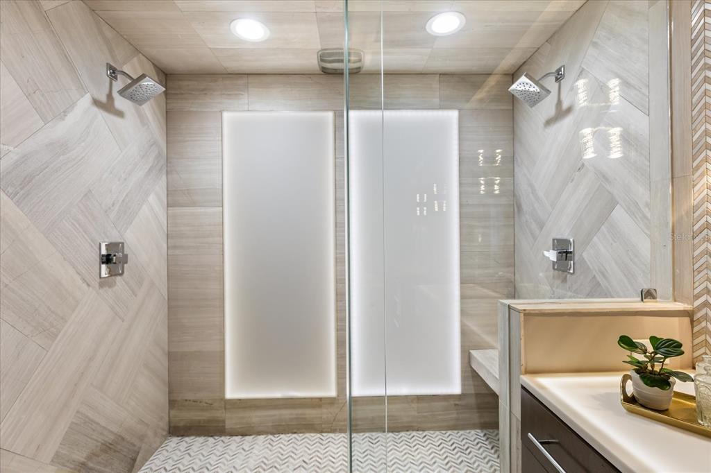 601 East Ridgewood Street Orlando, FL 32803 - Photo 37 of 86 a bathroom with a sink and shower