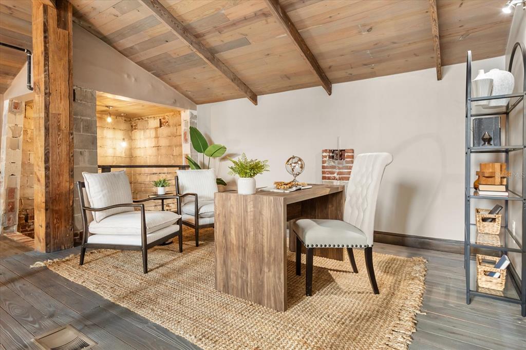 601 East Ridgewood Street Orlando, FL 32803 - Photo 49 of 86 a reading room with furniture and a window