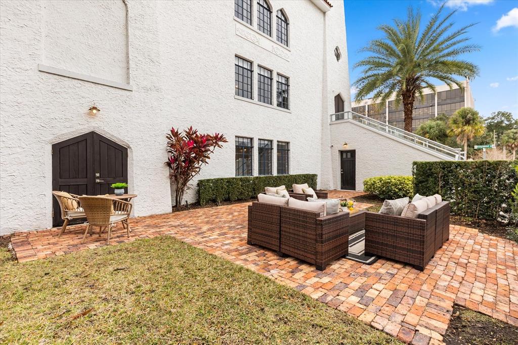 601 East Ridgewood Street Orlando, FL 32803 - Photo 65 of 86 a building outdoor space with patio furniture