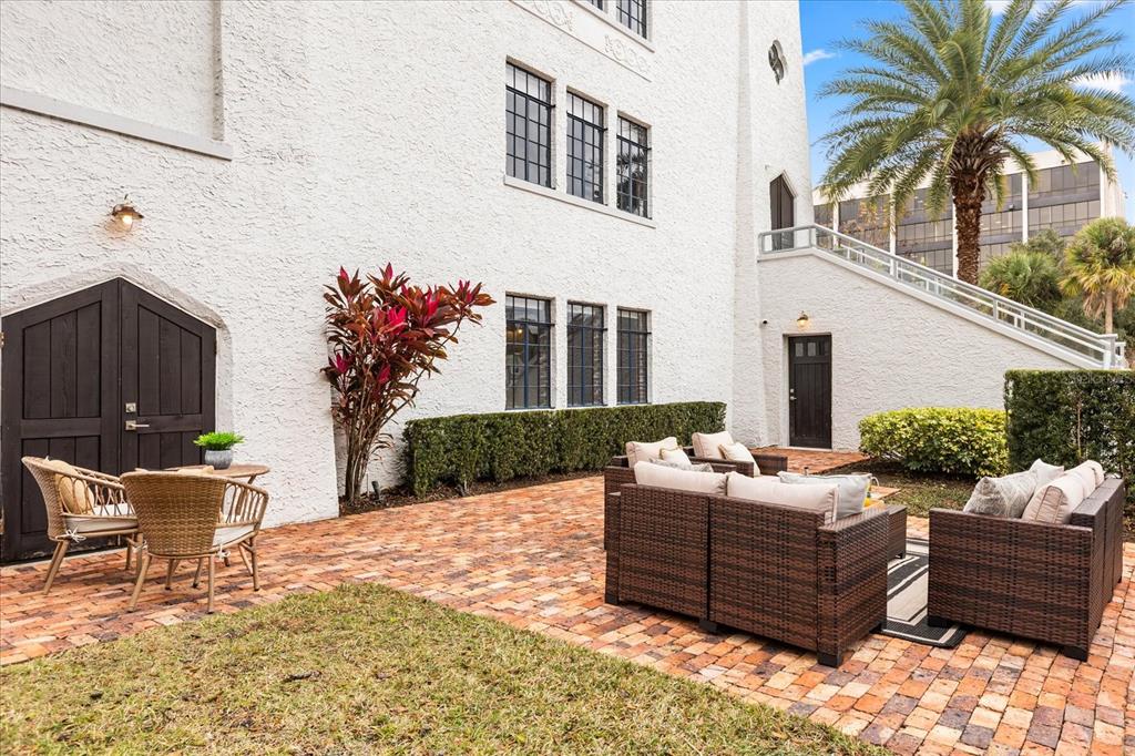 601 East Ridgewood Street Orlando, FL 32803 - Photo 66 of 86 a outdoor space with patio furniture and potted plants