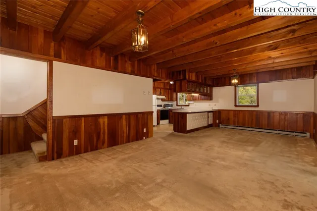 a view of a room with a large window