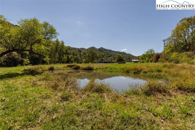 a view of a lake with a mountain in the background