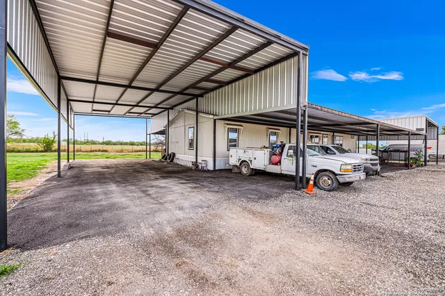 a view of a house with a big yard