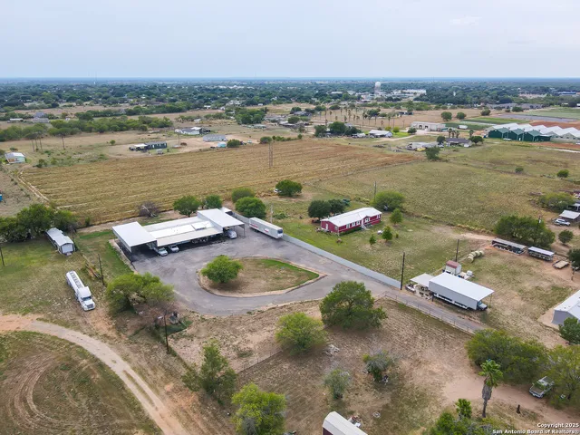 a view of a lake with a house in the background