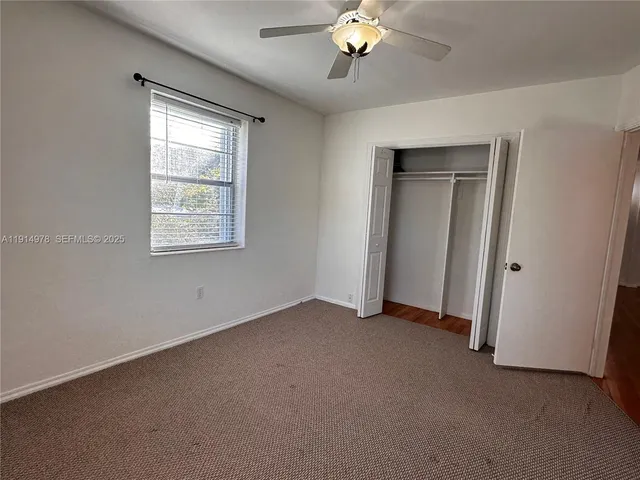 a bathroom with a toilet a sink and bathtub