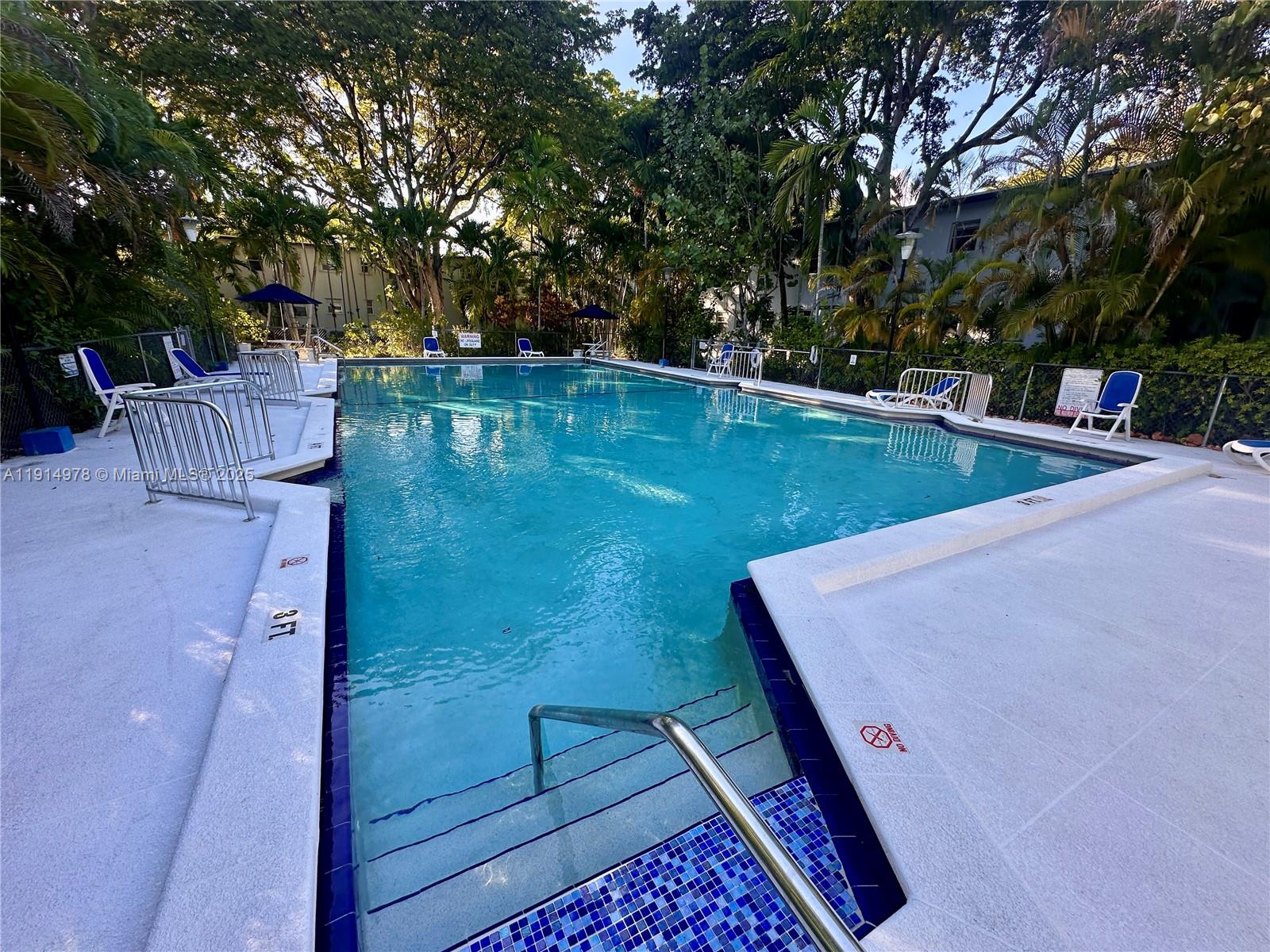 7940 Southwest 55th Avenue, Unit 67D Miami, FL 33143 - Photo 8 of 16 a view of an outdoor space and yard