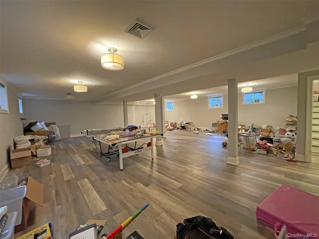 a living room with lots of furniture and a view of living room