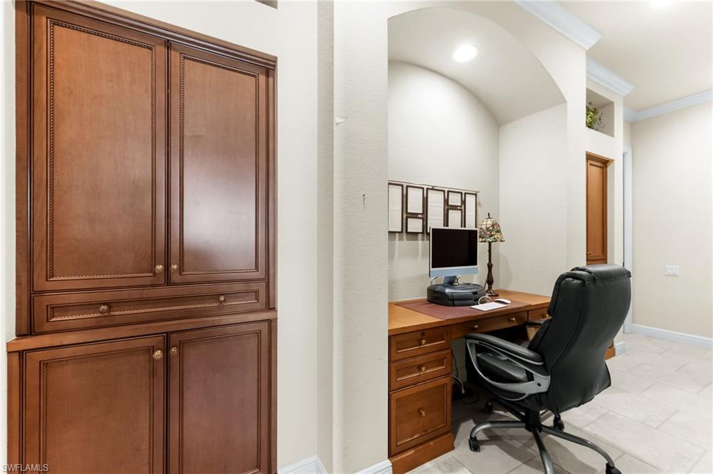 7615 Palmer Court Naples, FL 34113 - Photo 31 of 50 Office featuring crown molding and light tile patterned floors