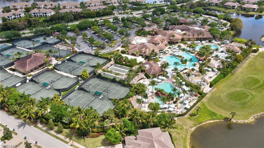 7615 Palmer Court Naples, FL 34113 - Photo 50 of 50 Aerial overview of property's location featuring a large body of water and nearby suburban area