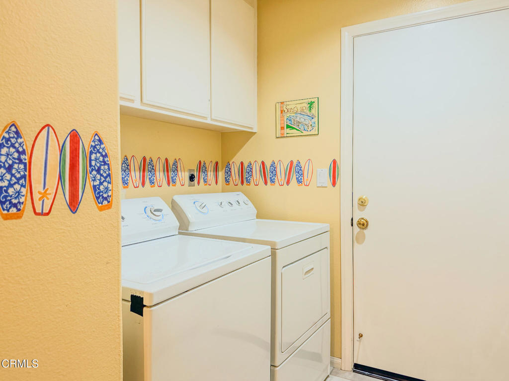 2300 Bayhill Court Oxnard, CA 93036 - Photo 25 of 28 a utility room with dryer and washer