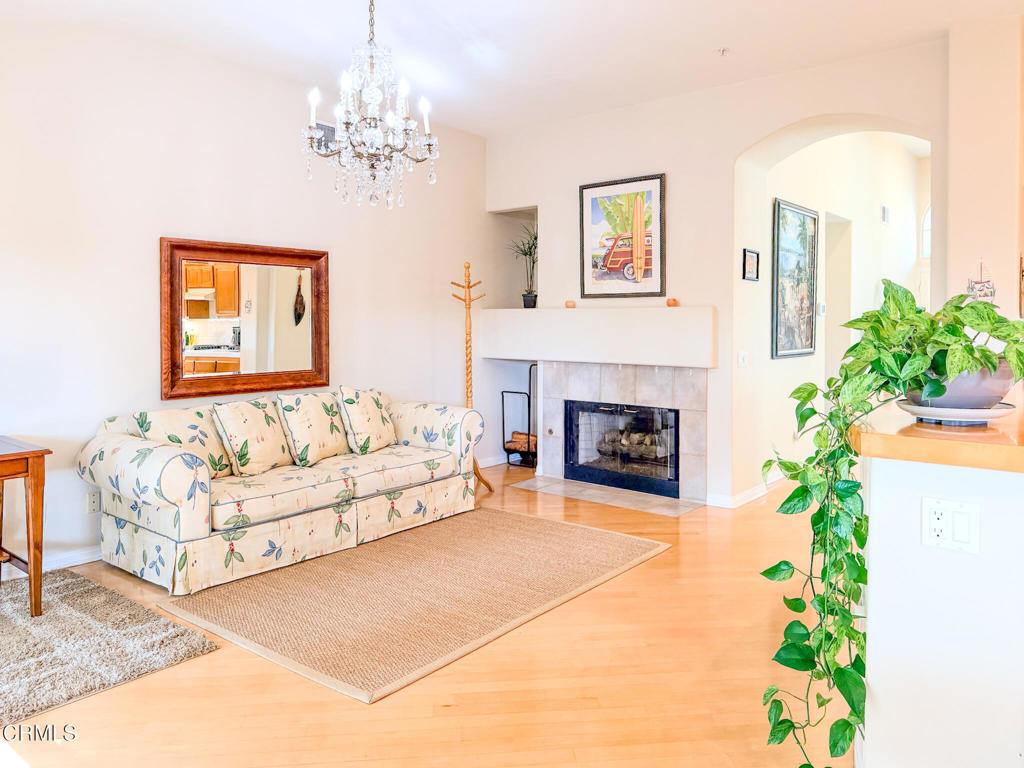 2300 Bayhill Court Oxnard, CA 93036 - Photo 6 of 28 a living room with furniture and a fireplace