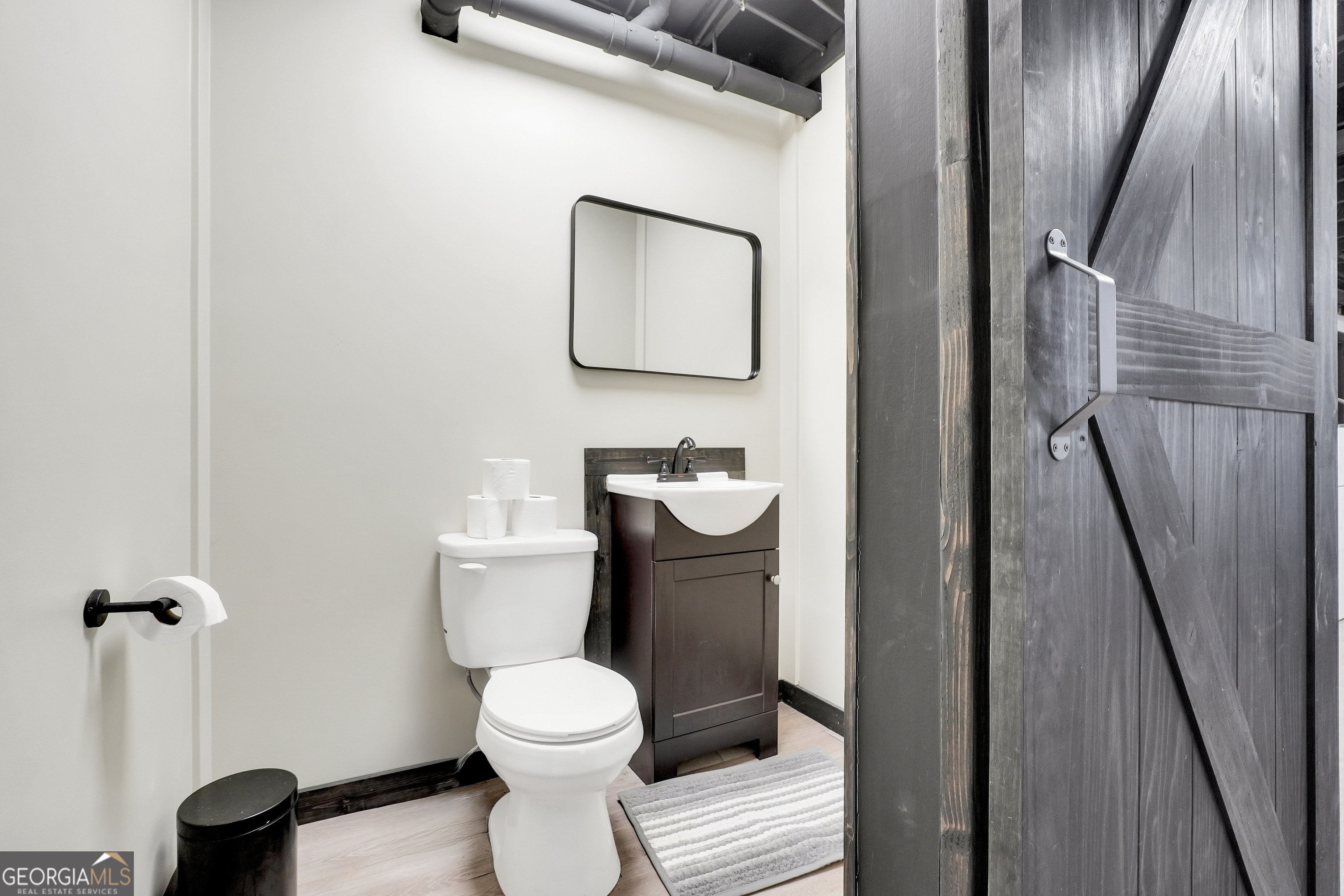 110 Westeria Way Jackson, GA 30233 - Photo 35 of 45 a bathroom with a toilet