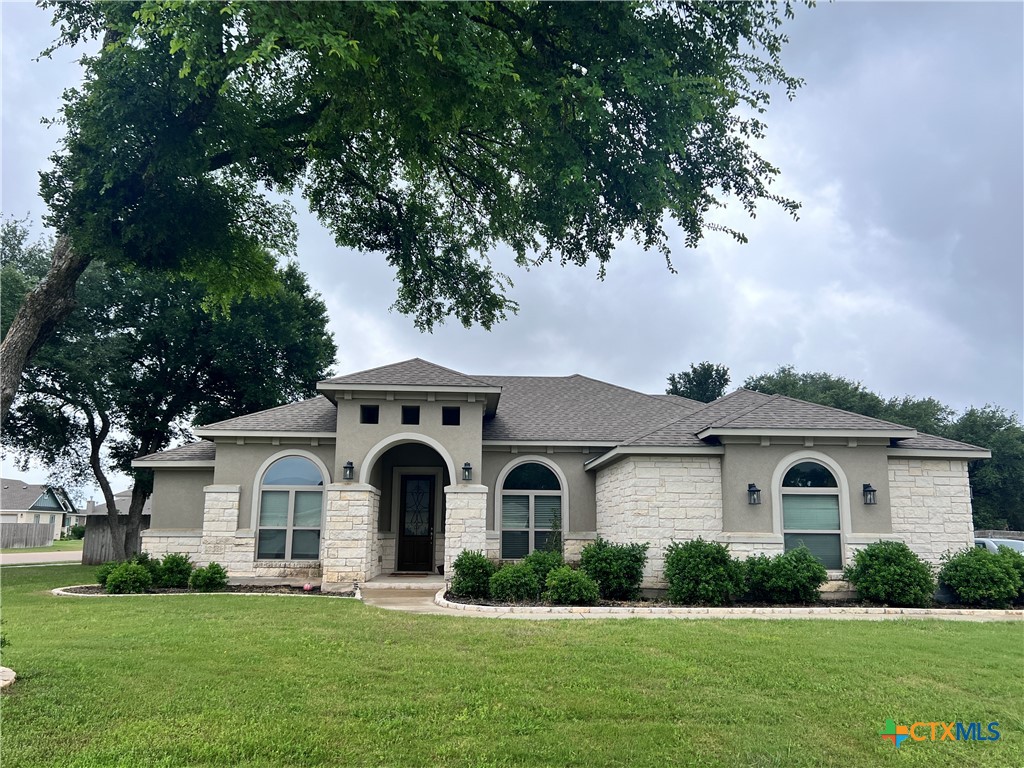 549 Wills Point Way Belton, TX 76513 - Photo 1 of 31 a front view of a house with a garden