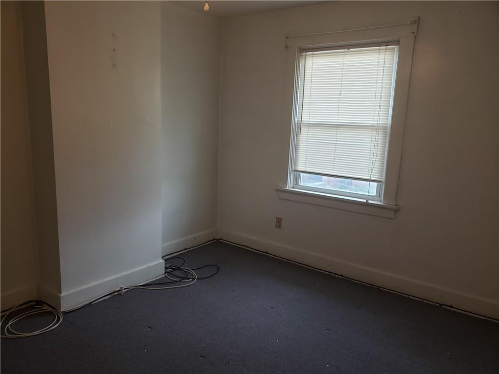 350 Coltart Avenue, Unit 2 Pittsburgh, PA 15213 - Photo 5 of 10 an empty room with a window
