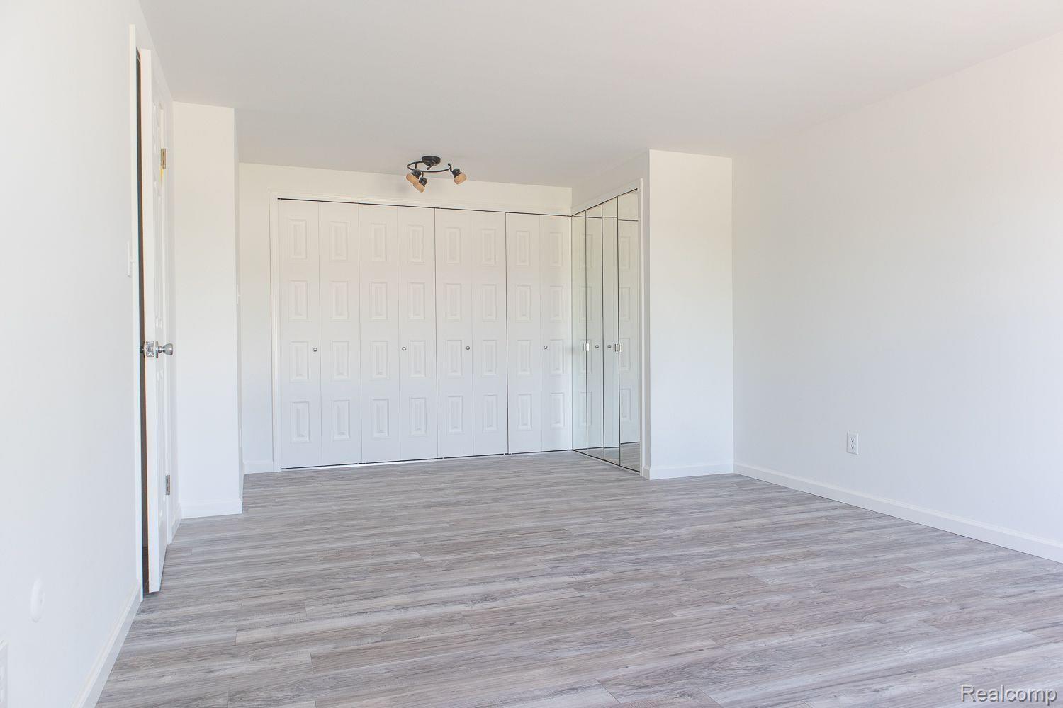8724 Common Road Warren, MI 48093 - Photo 19 of 22 PRIMARY BEDROOM WITH LOTS OF CLOSET SPACE
