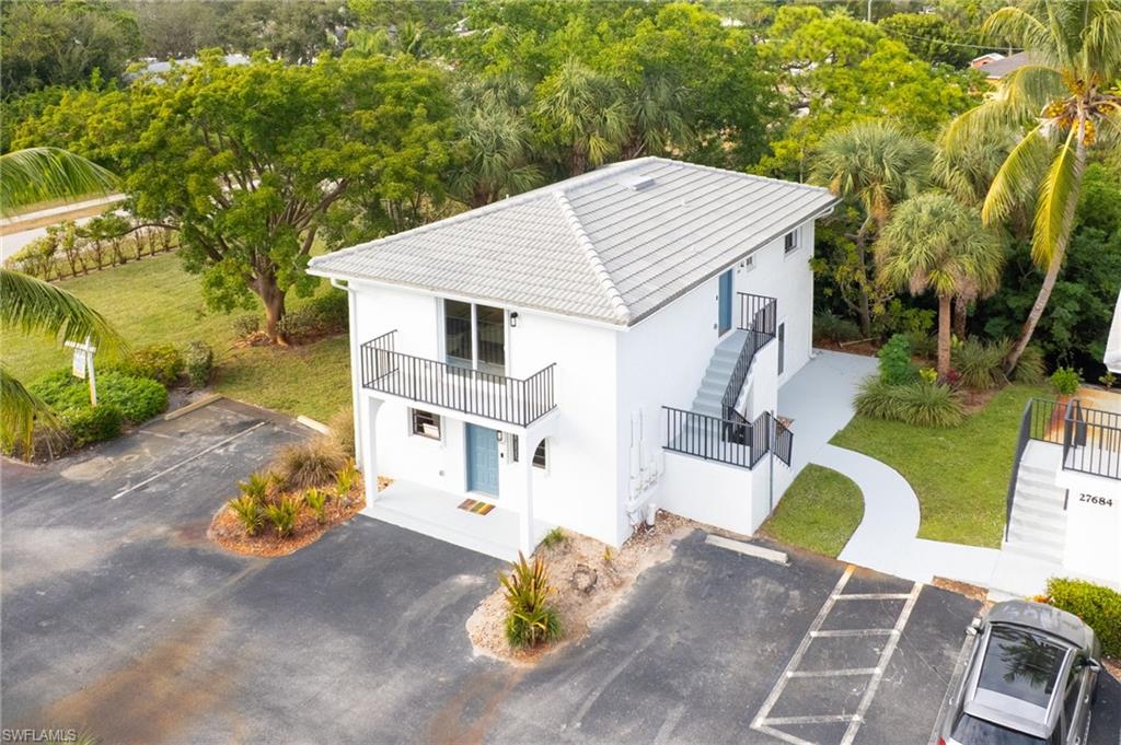 27682 Imperial River Road, Unit CH2 Bonita Springs, FL 34134 - Photo 21 of 26 a view of backyard of house