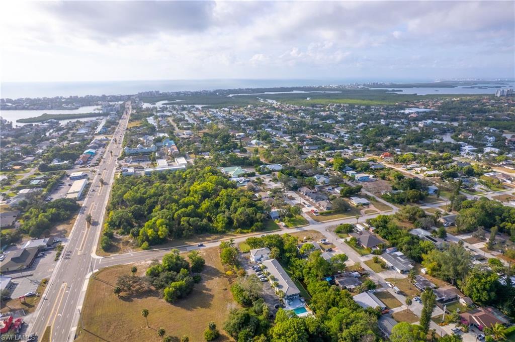 27682 Imperial River Road, Unit CH2 Bonita Springs, FL 34134 - Photo 22 of 26 an aerial view of multiple house