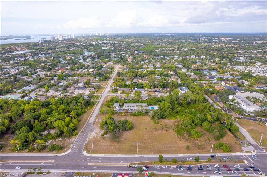 27682 Imperial River Road, Unit CH2 Bonita Springs, FL 34134 - Photo 26 of 26 an aerial view of residential houses with city view