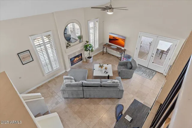 a living room with furniture and a window