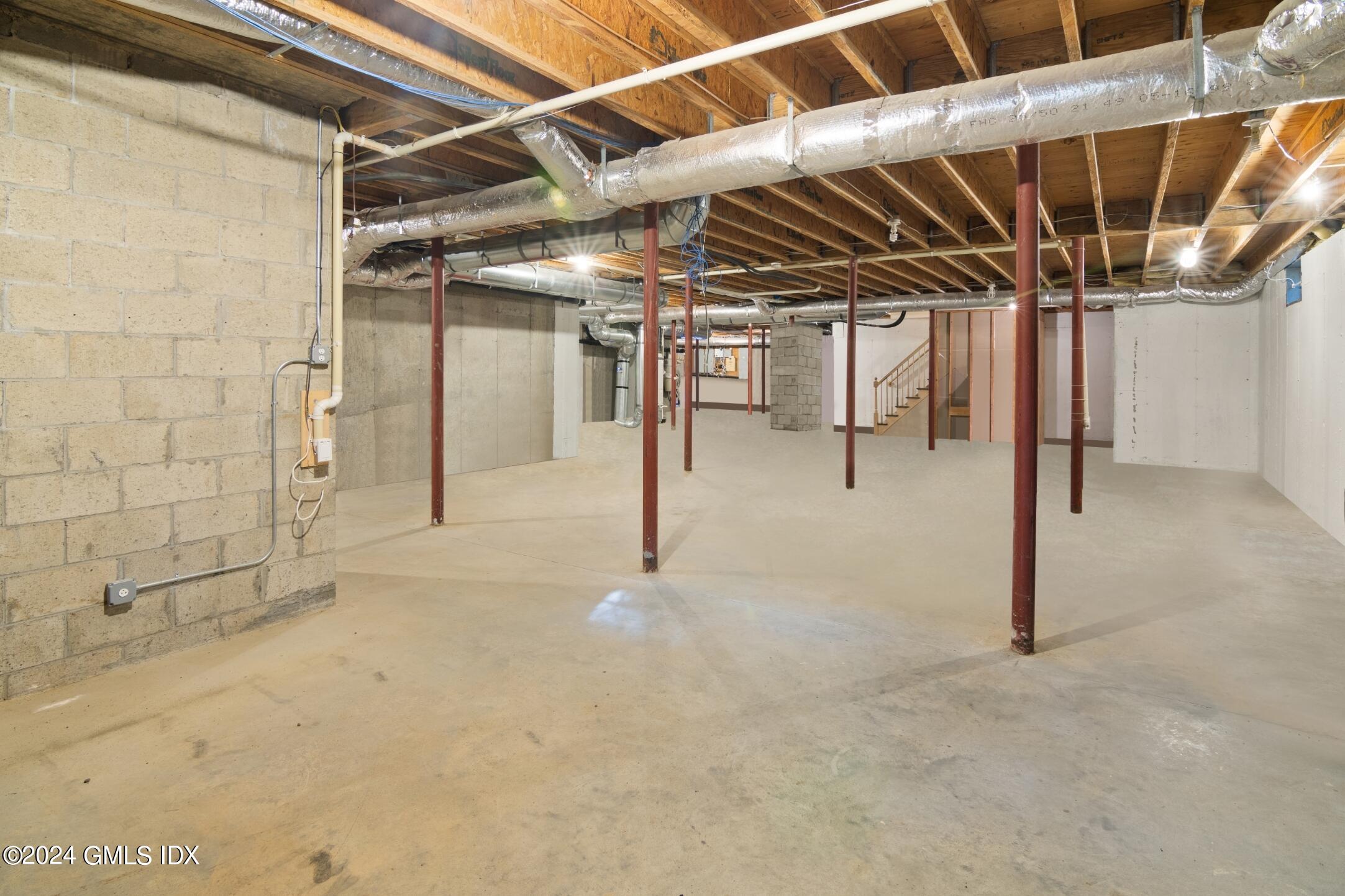 62 Brookridge Drive Greenwich, CT 06830 - Photo 6 of 13 a view of empty room with wooden walls