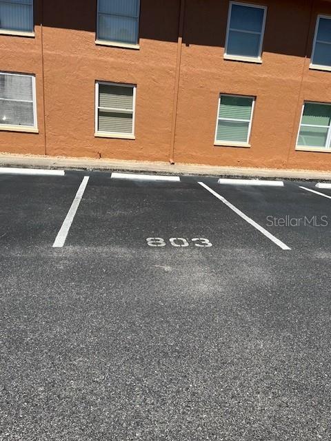 12760 Indian Rocks Road, Unit 803 Largo, FL 33774 - Photo 18 of 18 a view of a house with a yard