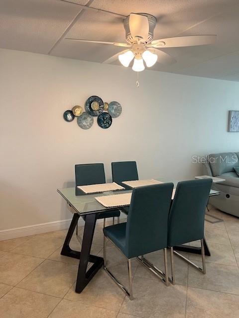 12760 Indian Rocks Road, Unit 803 Largo, FL 33774 - Photo 4 of 18 a view of a workspace with a table and chairs in a room