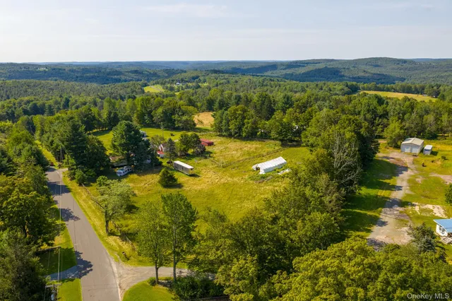 a view of a lake with mountains in the background