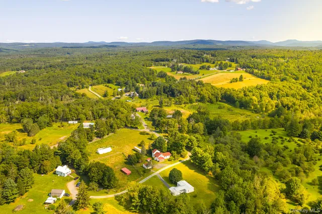 a view of a lake with a yard