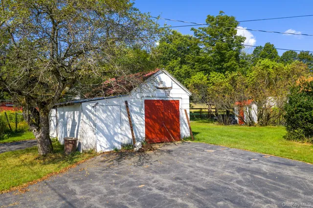 a view of backyard with green space