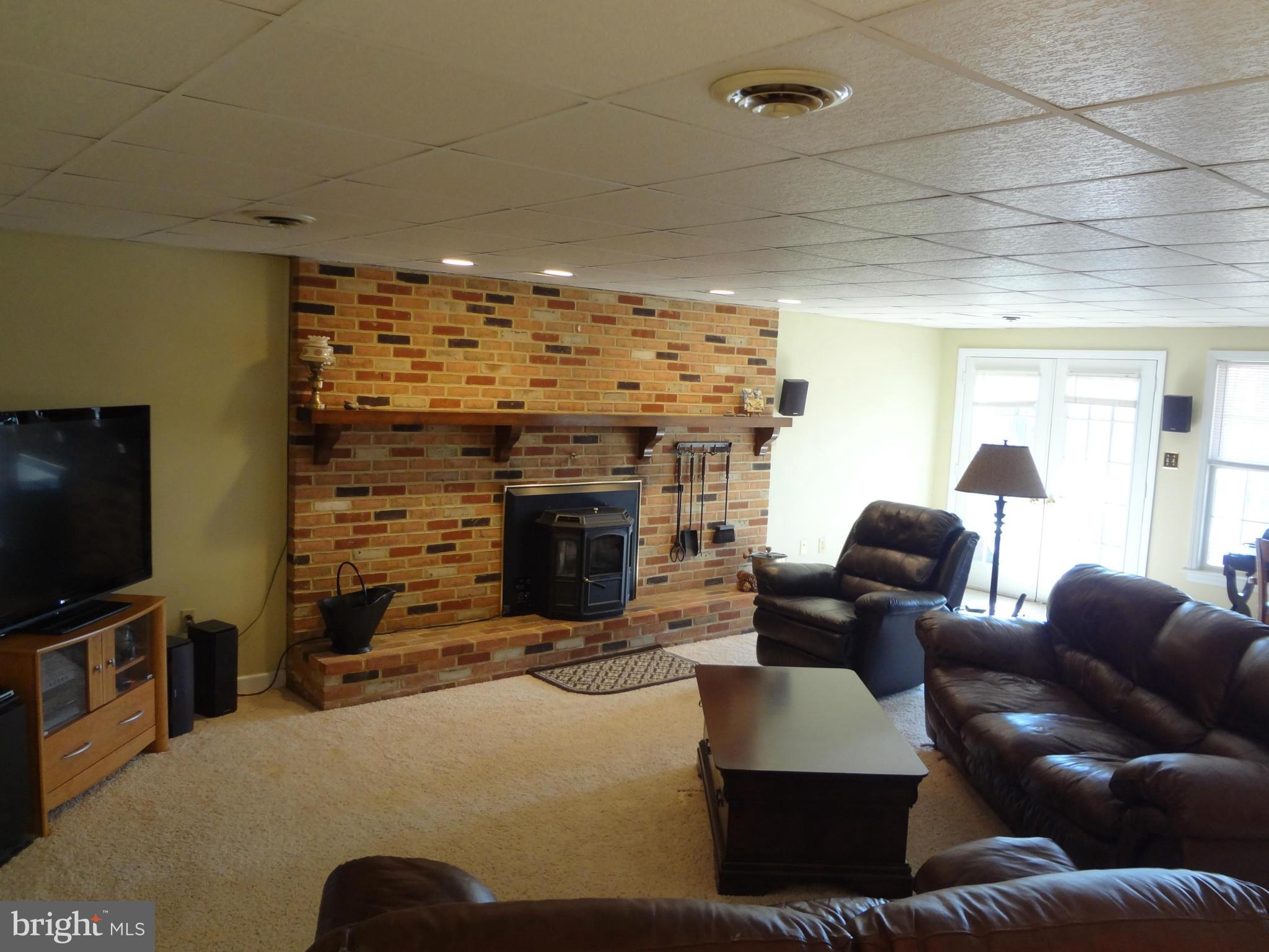 27 Rio Lane Falling Waters, WV 25419 - Photo 25 of 30 Fireplace with pellet stove insert