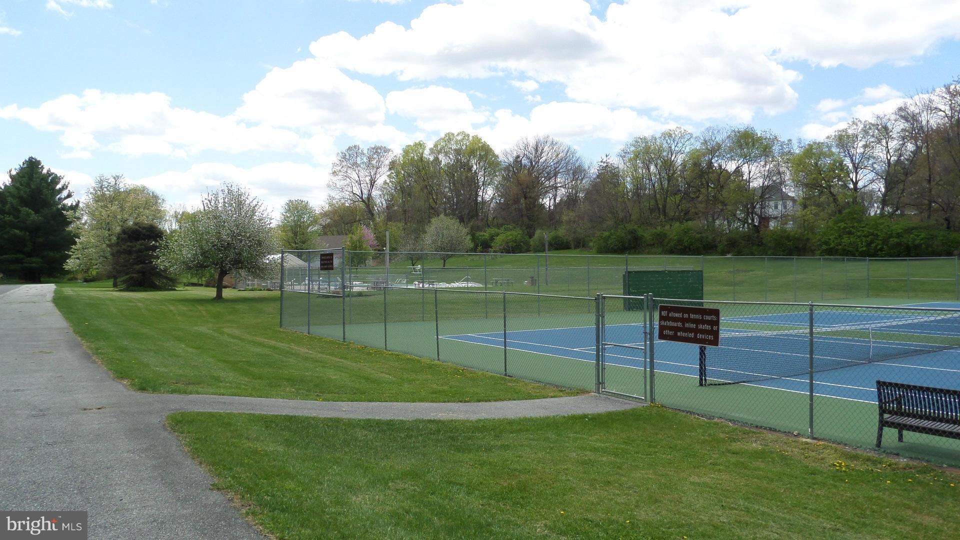 Community tennis court & pool area