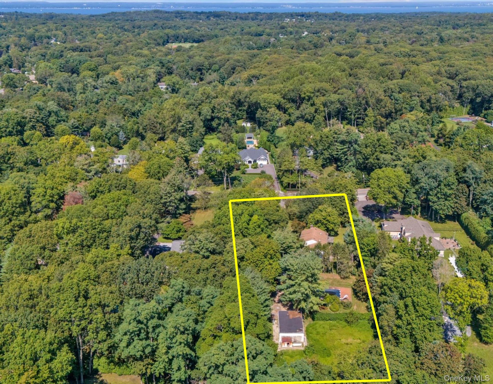 270 Frost Pond Road Glen Head, NY 11545 - Photo 5 of 19 Aerial view of property and surrounding area, property boundaries highlighted