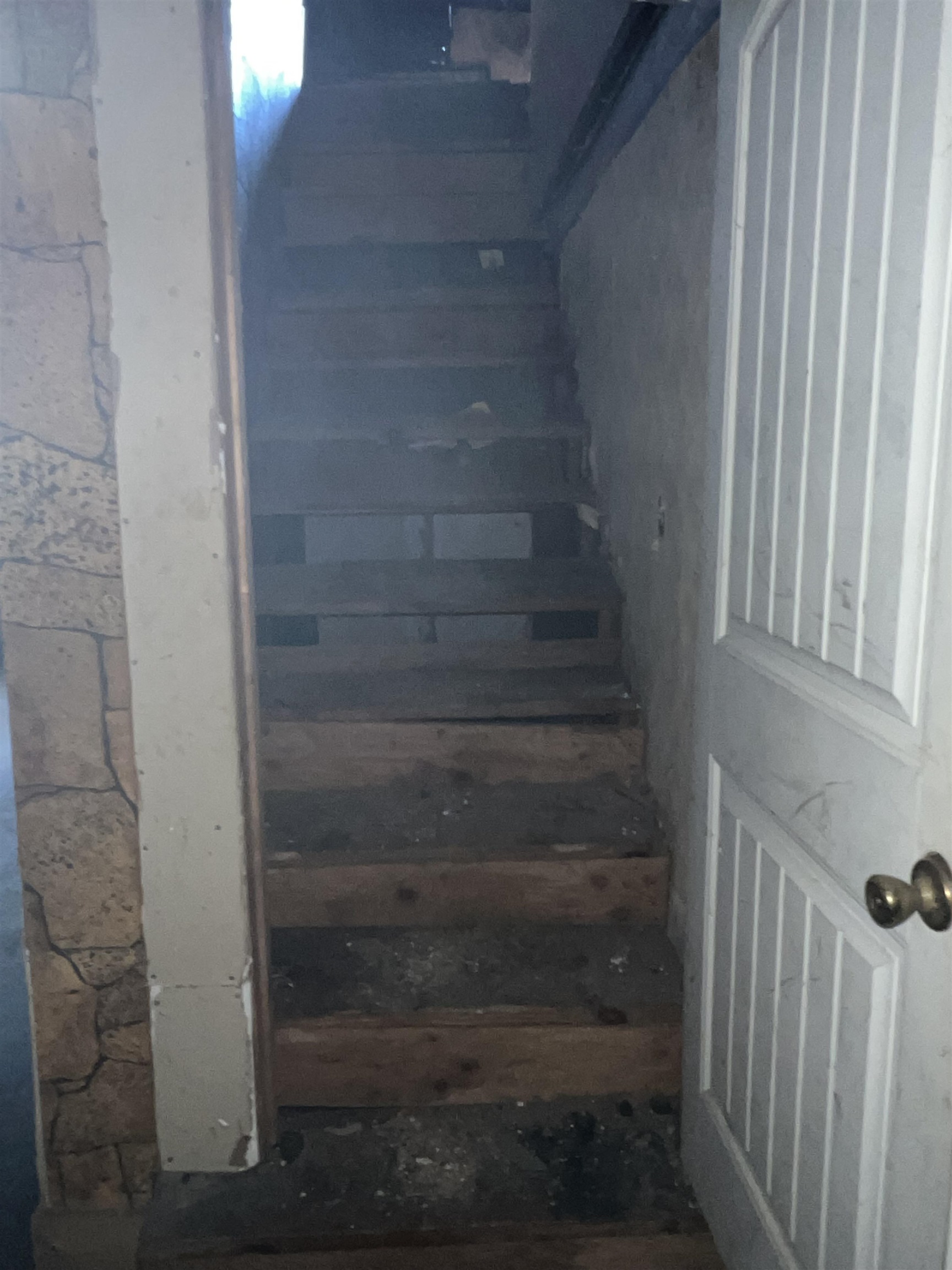 1211 Sylvan Street Memphis, TN 38107 - Photo 7 of 19 a view of staircase with white walls