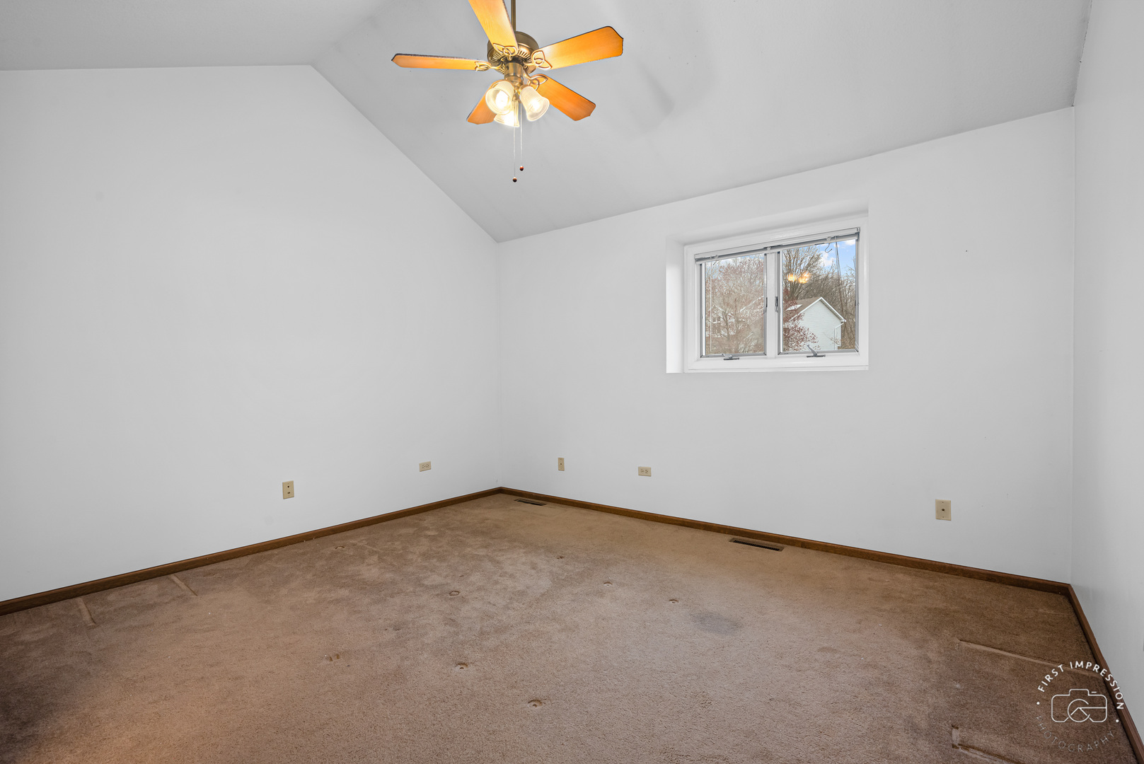 408 Grande Drive, Unit A Minooka, IL 60447 - Photo 11 of 20 an empty room with windows