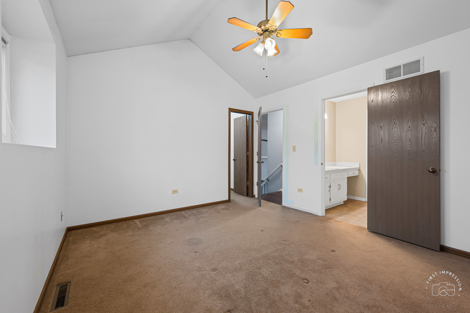 408 Grande Drive, Unit A Minooka, IL 60447 - Photo 12 of 20 a view of an empty room with a window