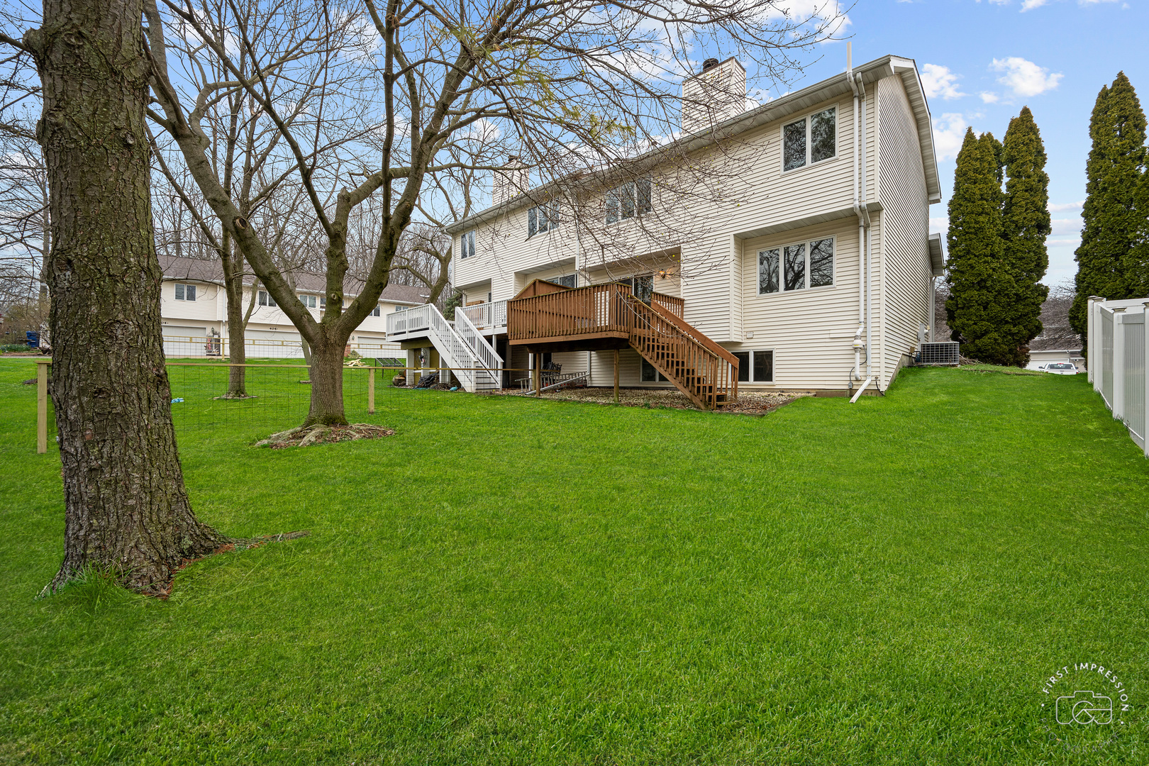 408 Grande Drive, Unit A Minooka, IL 60447 - Photo 20 of 20 a view of a house with a yard
